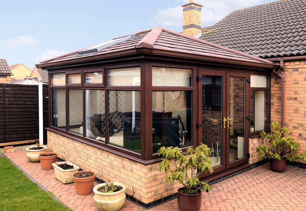 Rosewood conservatory with a tiled roof